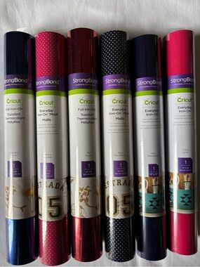 Cricut Iron-On Vinyl Rolls in Navy, Bright Pink, Red, and Polka Dot Navy